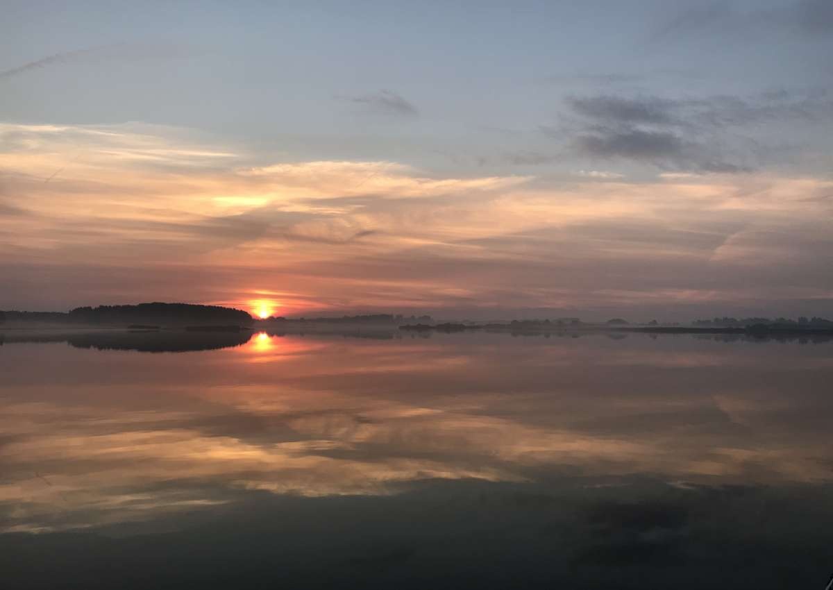 Zonsondergang op het Lauwersmeer - Foto bei Lauwersoog